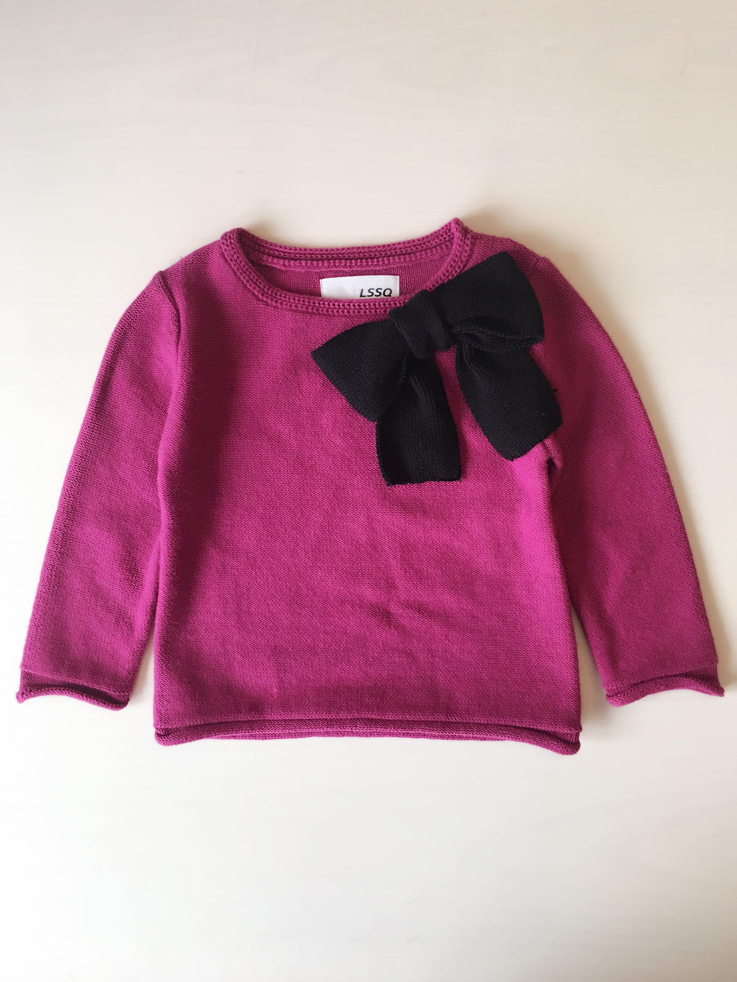 Girl Pink Sweater with Black Ribbon Decoration